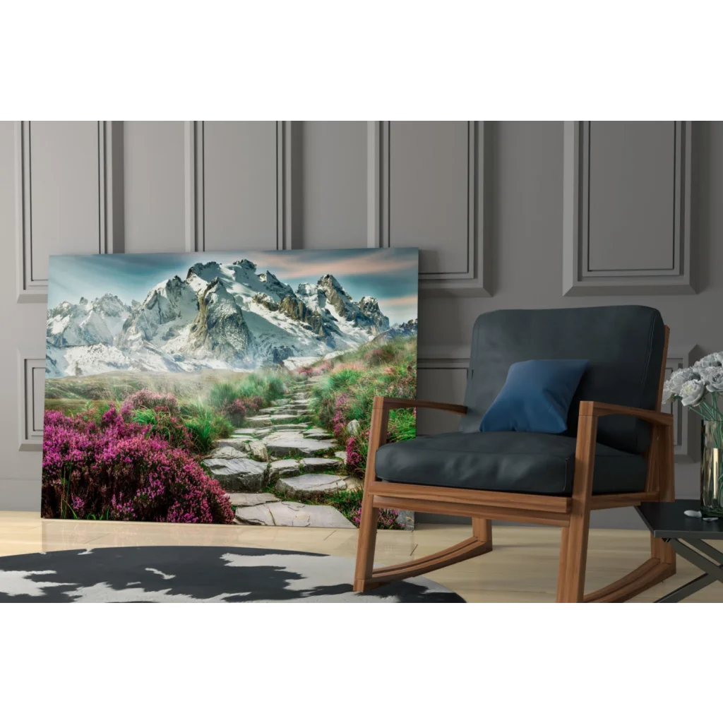 Stunning glass wall art print of snowy mountain trail in purple flora on wall