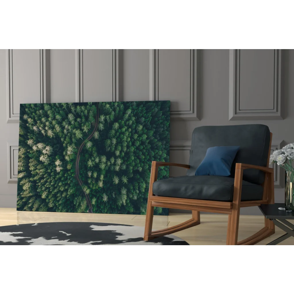 Dark blue rocking chair with wooden frame on lush forest path glass wall art