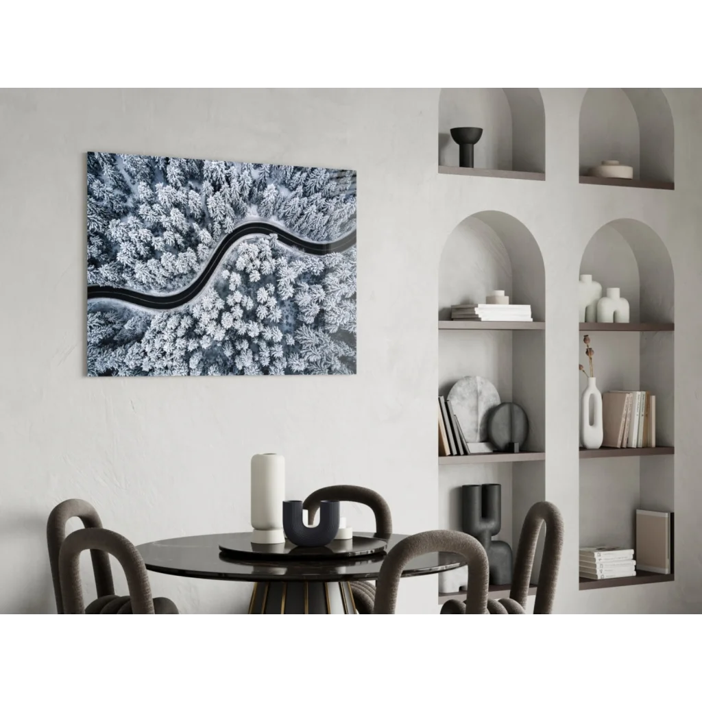 Black-and-white aerial view of snowy forest road as canvas wall art
