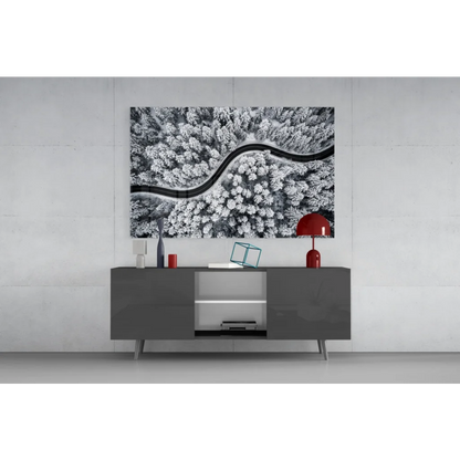 Sleek gray console table under Snowy Forest Road wall art canvas