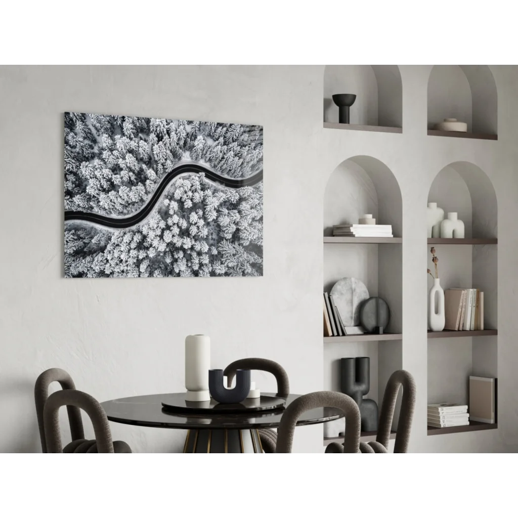 Black and white aerial view of snowy forest road wall art canvas