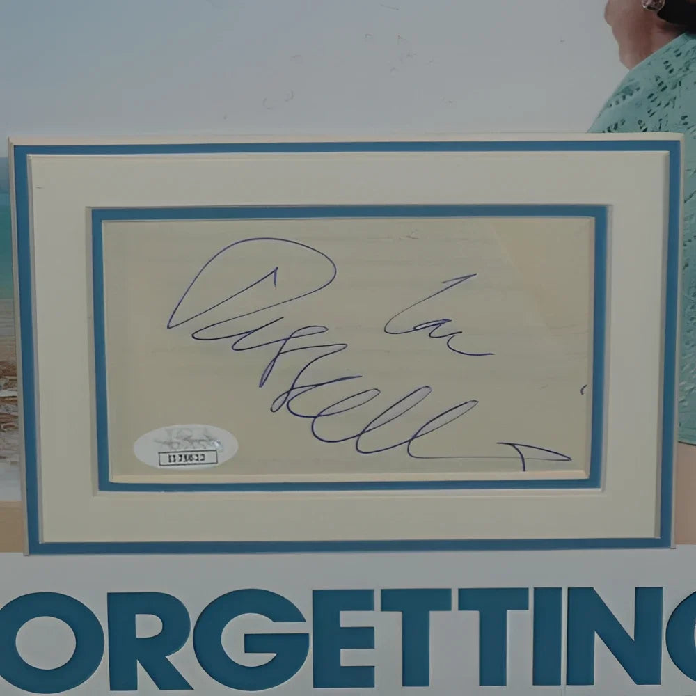 Framed Forgetting Sarah Marshall poster with Kristen Bell autograph on beige paper