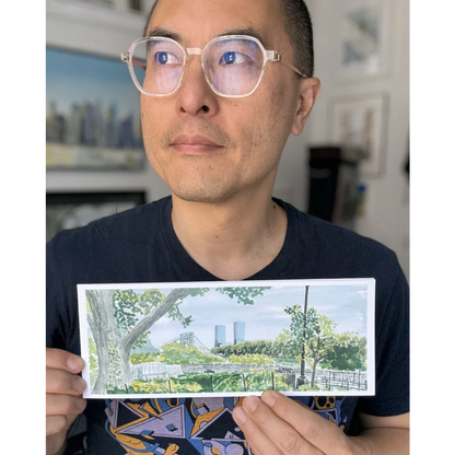 Person holding Fort Tryon Park plein air watercolor canvas with trees and sky