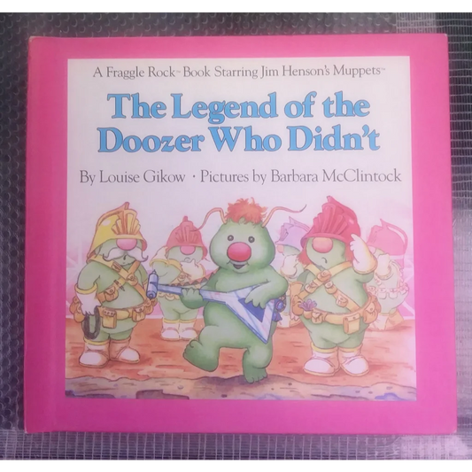 Vintage 1984 Fraggle Rock book with pink cover and Doozer illustration