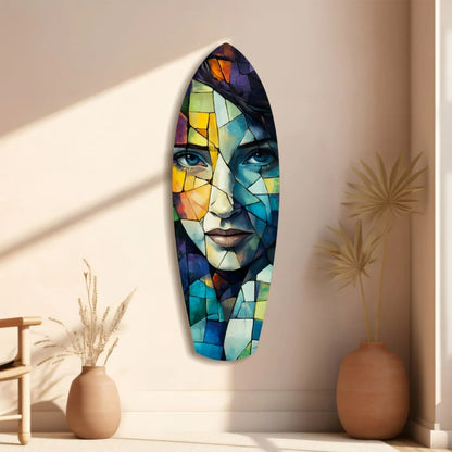 Vibrant tempered glass art of mosaic surfboard with geometric face in blues, yellows, purples