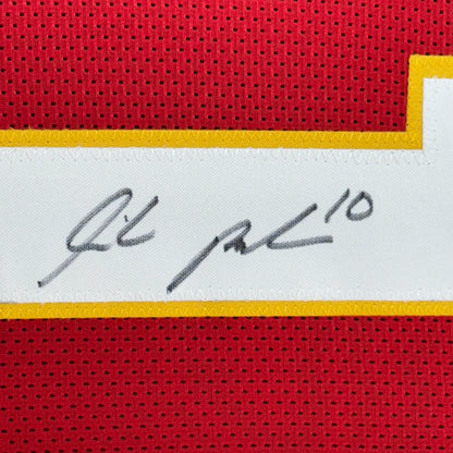 Red Kansas City Chiefs jersey with black signature and 10 on white stripe ready to hang