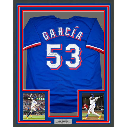 Autographed Blue Baseball Jersey Number 5 in a frame with player photos and plaque