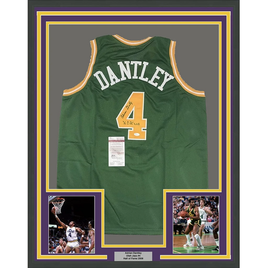 Green mesh basketball jersey with white and gold trim featuring dantley above number 4 from utah signed framed