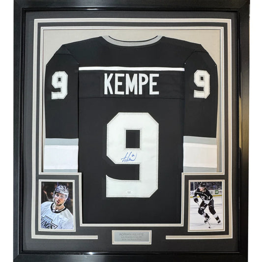 Framed autographed Adrian Kempe Los Angeles Kings jersey with player photos and plaque