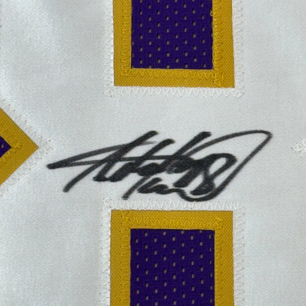 White Vikings jersey signed in black ink with purple and gold accents ready to dominate