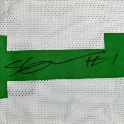 White and green Jets jersey with black marker autograph, perfect for fans
