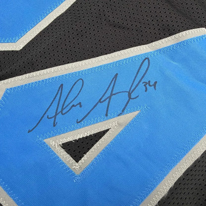 Framed Autographed Alex Anzalone 35x39 Detroit Black Football Jersey Beckett BAS COA | Certified Authentic Signed Memorabilia | vintageantiquesgifts.com