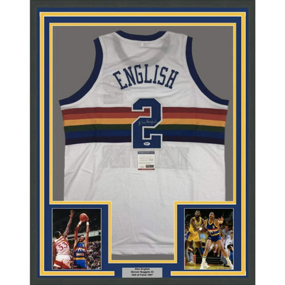 Back of Alex English autographed Denver Nuggets rainbow stripe white basketball jersey number 2 in navy and gold