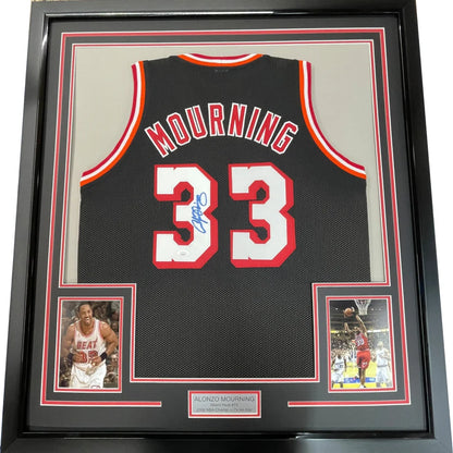 Framed autographed Alonzo Mourning Miami Heat black jersey with number 33 JSA COA