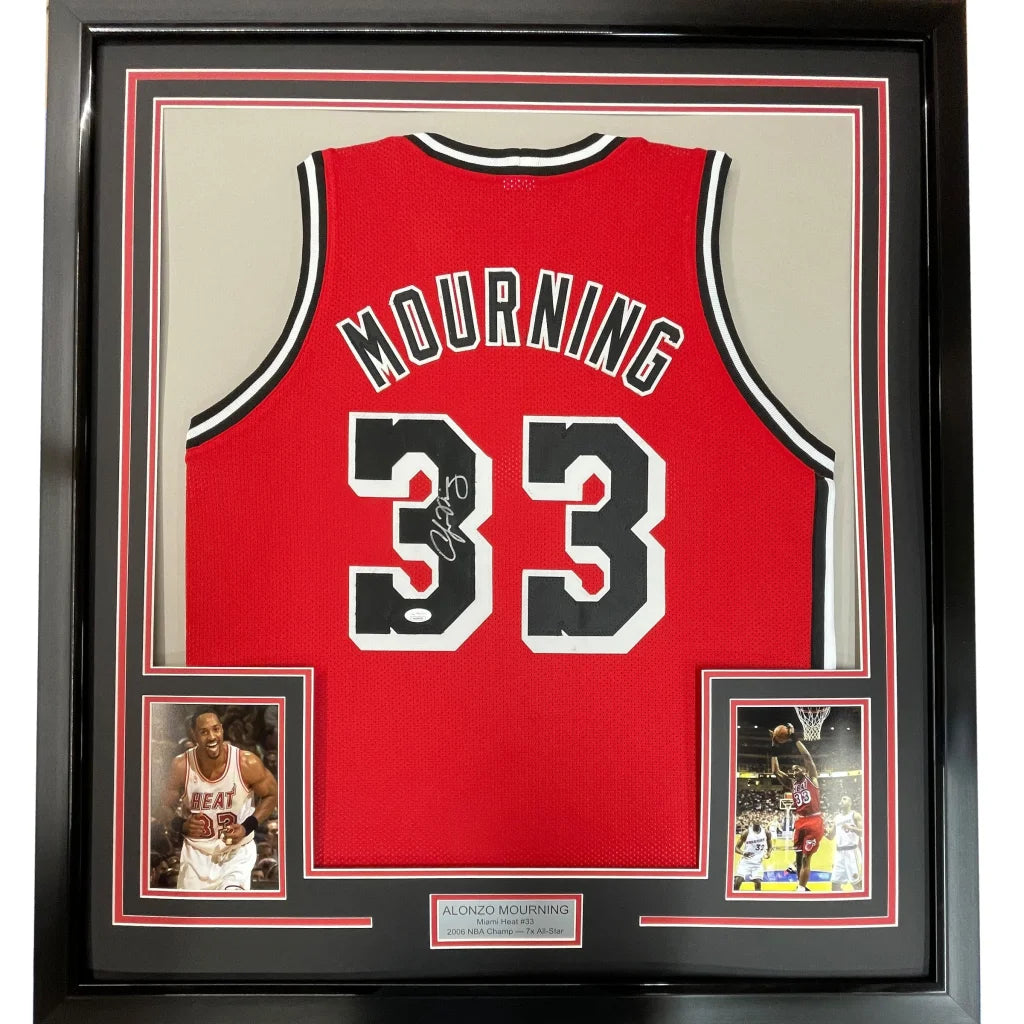 Professionally framed Alonzo Mourning autographed jersey with photos and plaque display