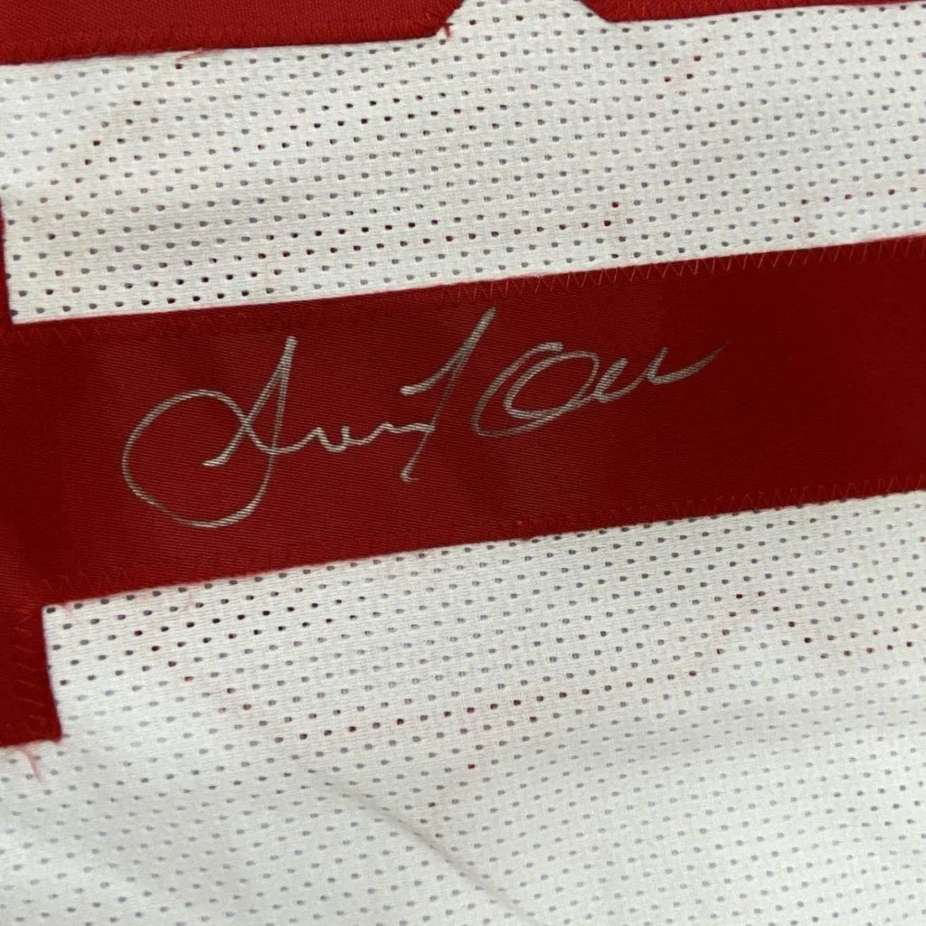 Framed Autographed Amani Toomer 35x39 New York White Football Jersey PSA/DNA COA | Certified Authentic Signed Memorabilia | vintageantiquesgifts.com