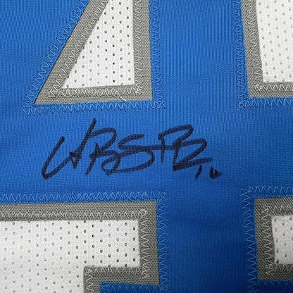 Framed Autographed Amon-Ra St. Brown 35x39 Detroit White Football Jersey Beckett BAS COA | Certified Authentic Signed Memorabilia | vintageantiquesgifts.com
