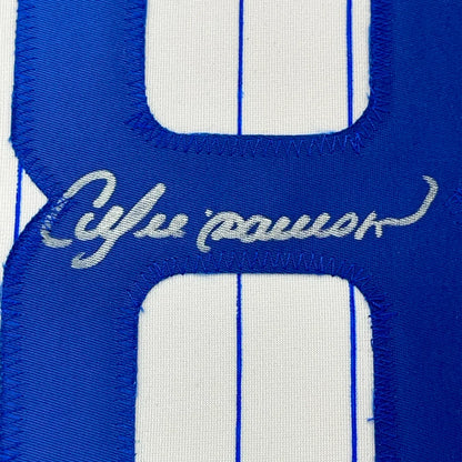 Blue and white striped Andre Dawson Cubs signed baseball jersey ready to hang on your wall