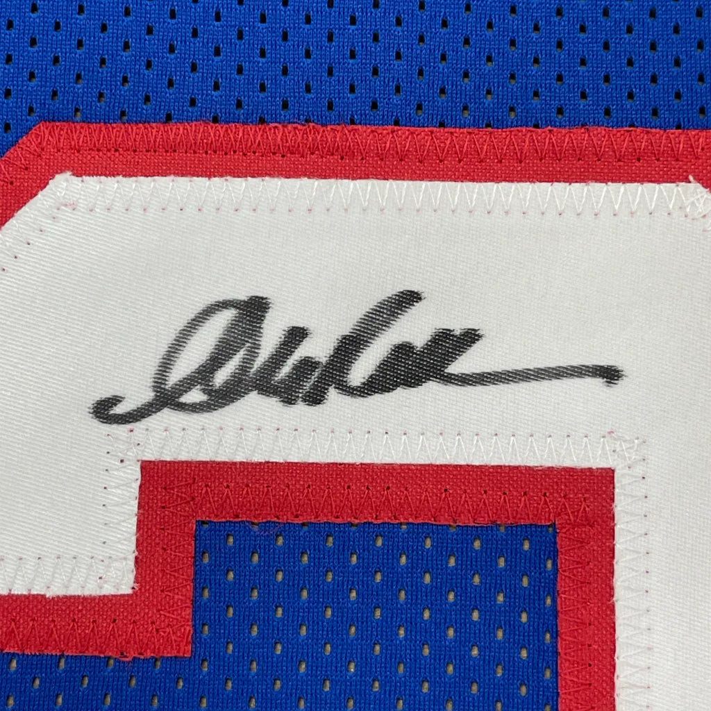 Autographed blue Andre Reed jersey with PSA DNA, professionally framed display