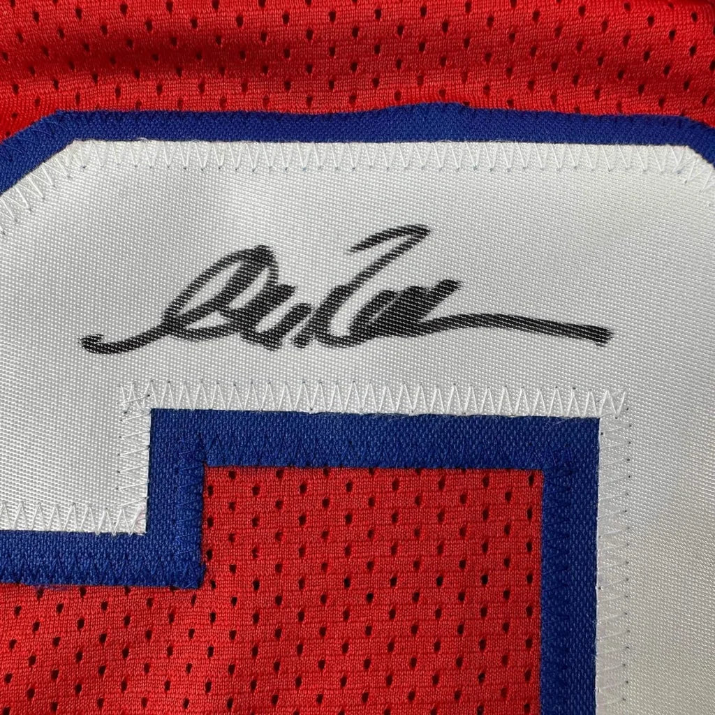 Red Buffalo Bills jersey with a black autograph ready to display