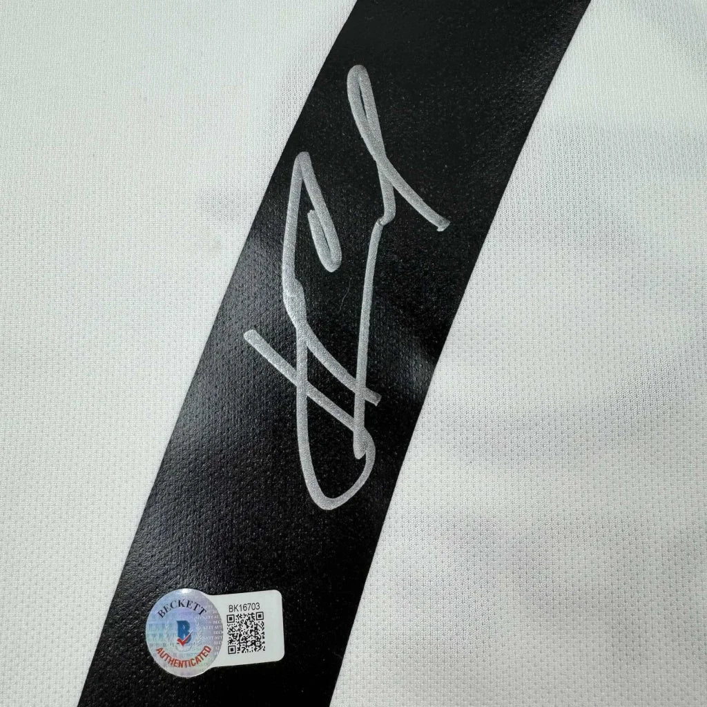 Black diagonal stripe with silver autograph and beckett authentication sticker on framed andriy shevchenko ac milan jersey