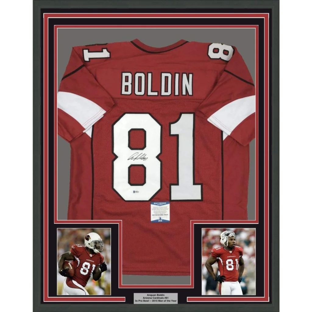 Back of a framed autographed red arizona cardinals football jersey with white number 81 and boldin name