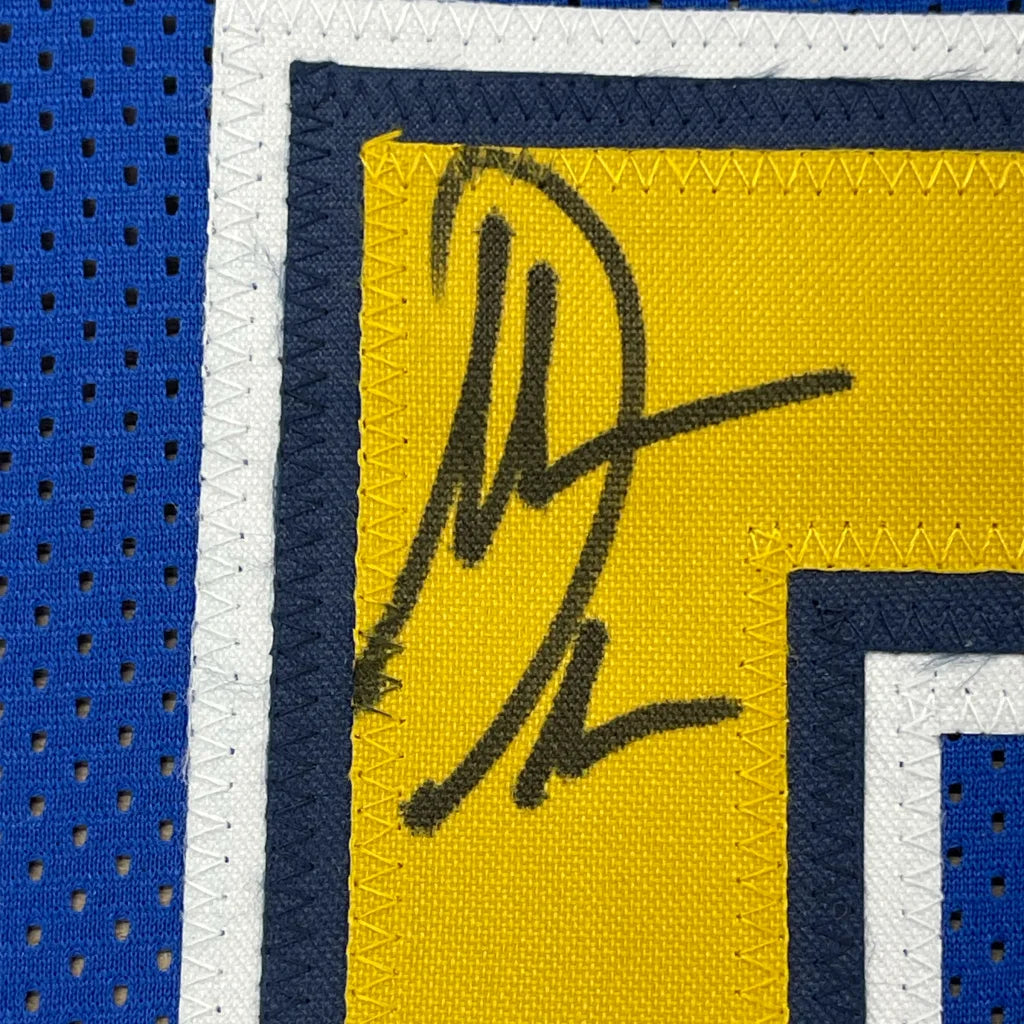 Blue and yellow Antonio Gates signed jersey with autograph, ready for display
