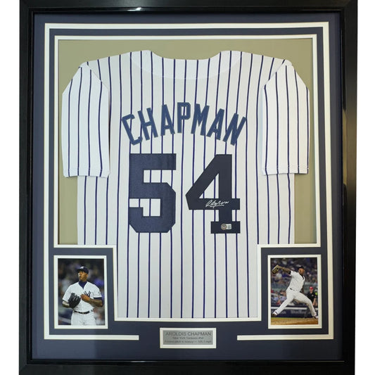 Framed signed New York Yankees Aroldis Chapman #54 jersey with player photos for display