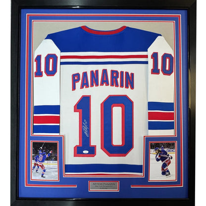 Framed autographed Artemi Panarin New York Rangers white jersey with blue, white, red accents, JSA COA