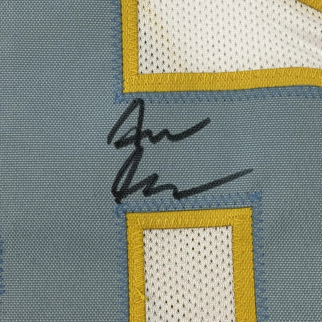 Blue fabric with gold trim and signature on Asante Samuel Jr custom jersey for professional sports fans