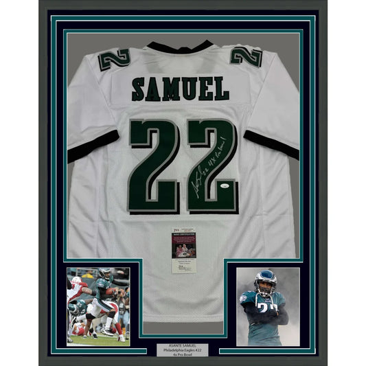 Framed autographed Philadelphia Eagles jersey with player photos for fans and collectors