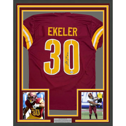 Framed Autographed Austin Ekeler 35x39 Washington Burgundy Football Jersey Beckett BAS COA | Hall of Fame Sports Memorabilia | vintageantiquesgifts.com