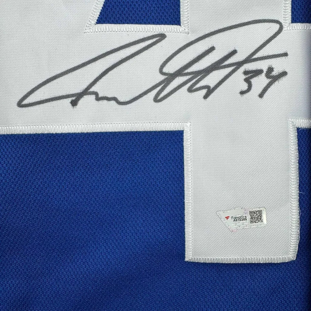Blue Austin Matthews jersey with white number and black marker autograph, third party authentication