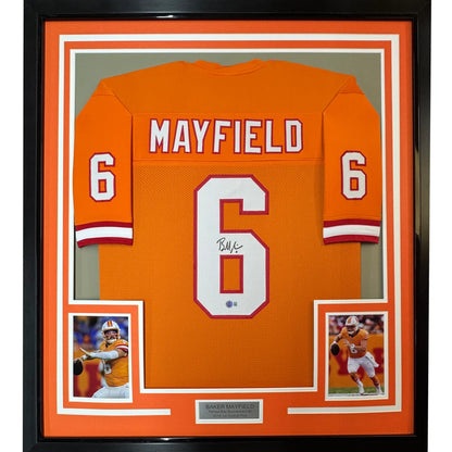 Framed autographed orange clemson tigers football jersey with white and red number 6 signed by Baker Mayfield