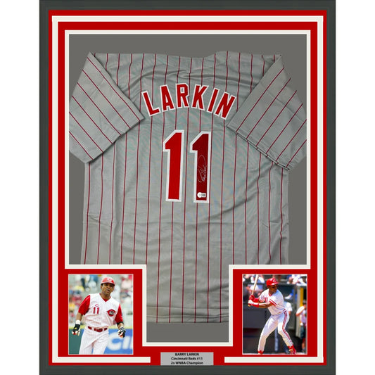 Framed Autographed Barry Larkin 35x39 Cincinnati Grey Pinstripe Baseball Jersey Beckett BAS COA | Hall of Fame Sports Memorabilia | vintageantiquesgifts.com