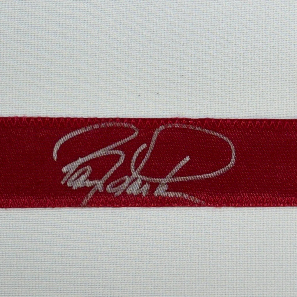 Red ribbon with white signature on Barry Larkin professionally framed jersey with Beckett BAS COA