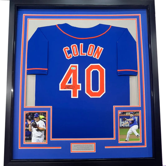 Framed Autographed Bartolo Colon 35x39 New York Blue Baseball Jersey Beckett BAS COA | Hall of Fame Sports Memorabilia | vintageantiquesgifts.com