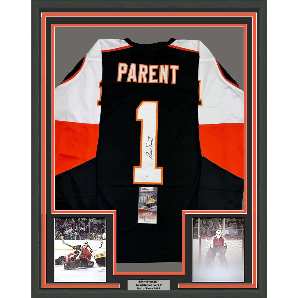 Framed autographed black Philadelphia Flyers Bernie Parent jersey with name Parent and number 1