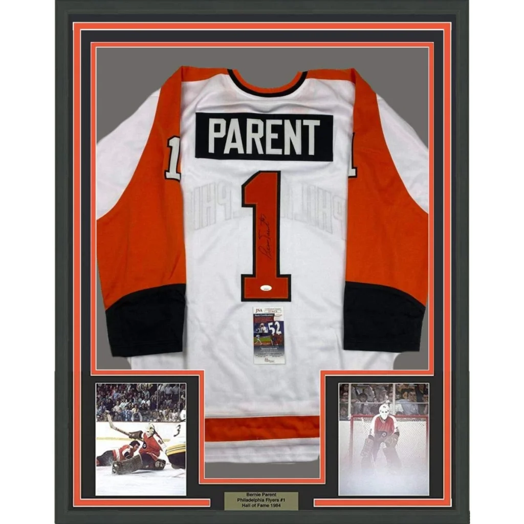 Framed signed Bernie Parent white Philadelphia Flyers jersey with Parent 1