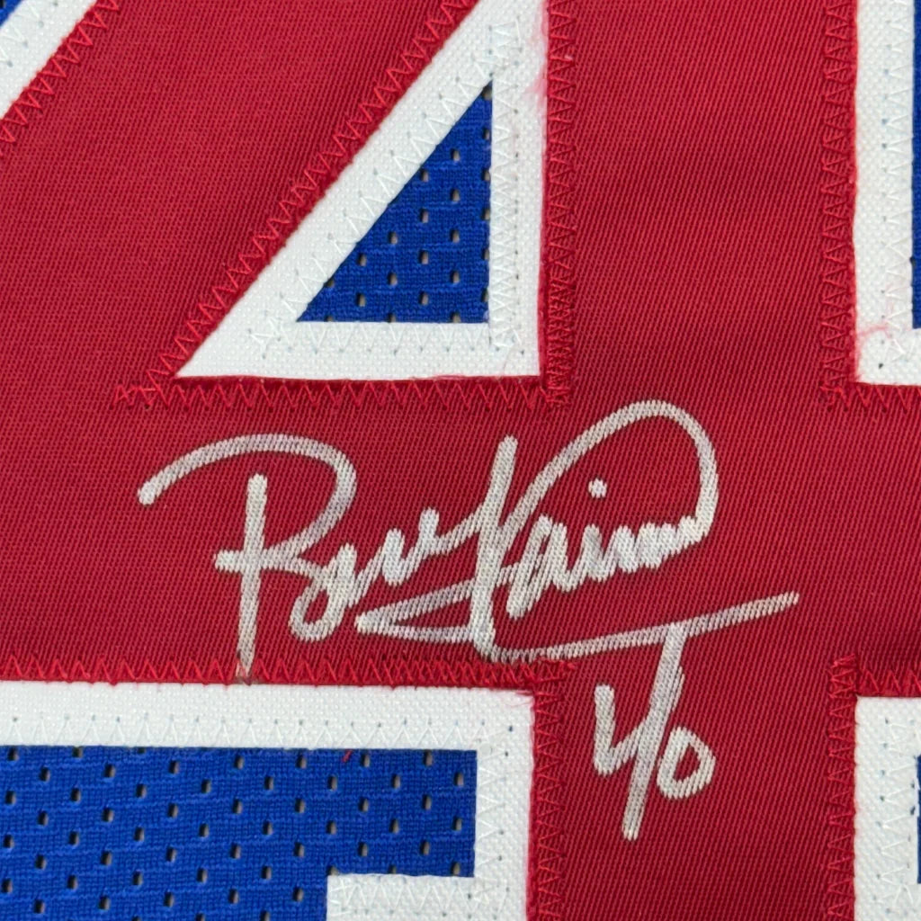 Red sports jersey with white signature and 4/0, professionally framed Detroit blue basketball jersey