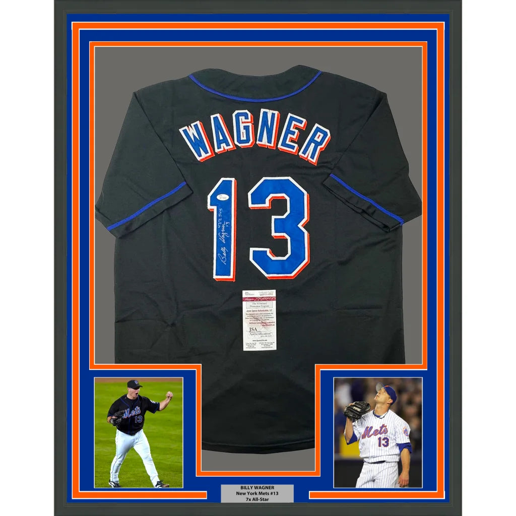 Framed autographed black baseball jersey with player photos for display