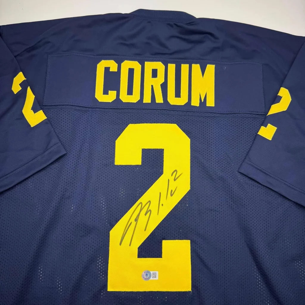 Framed Autographed Blake Corum Michigan 35x39 Blue Stat College Football Jersey Beckett BAS COA | Certified Authentic Signed Memorabilia | vintageantiquesgifts.com