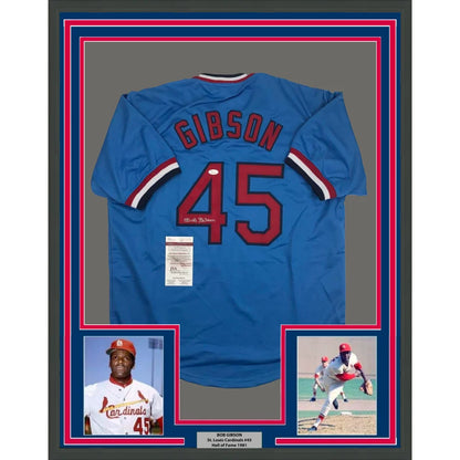 Framed Bob Gibson Cardinals jersey with autograph and two photos for display