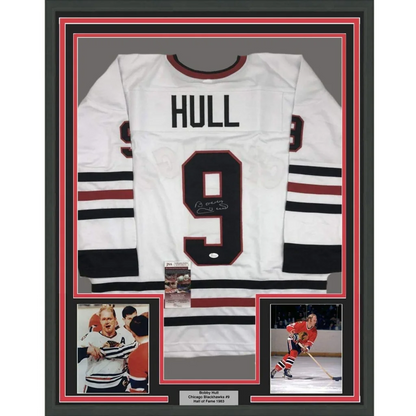 Professionally framed Bobby Hull Chicago White hockey jersey with autographs and photos for man cave