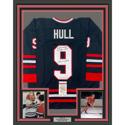 Framed Autographed Bobby Hull HOF 1983 35x39 Chicago Black Hockey Jersey JSA COA | Hall of Fame Sports Memorabilia | vintageantiquesgifts.com