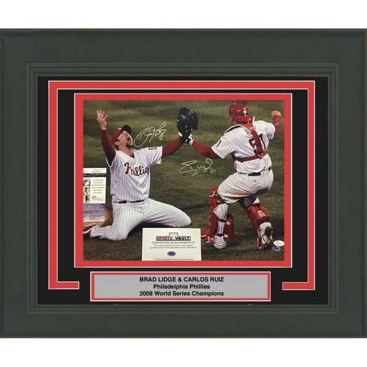 Framed Brad Lidge Carlos Ruiz dual signed championship photo celebrating baseball victory