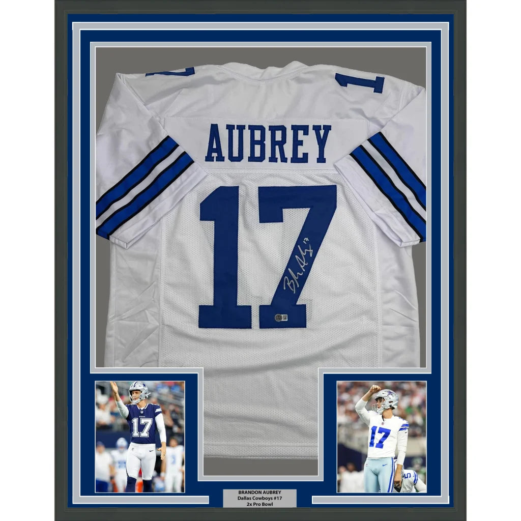 Framed Autographed Brandon Aubrey 35x39 Dallas White Football Jersey Beckett BAS COA | Hall of Fame Sports Memorabilia | vintageantiquesgifts.com