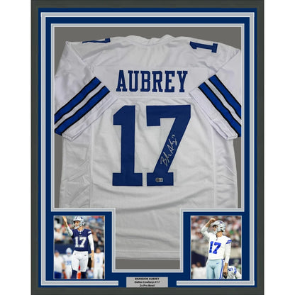 Framed Autographed Brandon Aubrey 35x39 Dallas White Football Jersey Beckett BAS COA | Hall of Fame Sports Memorabilia | vintageantiquesgifts.com