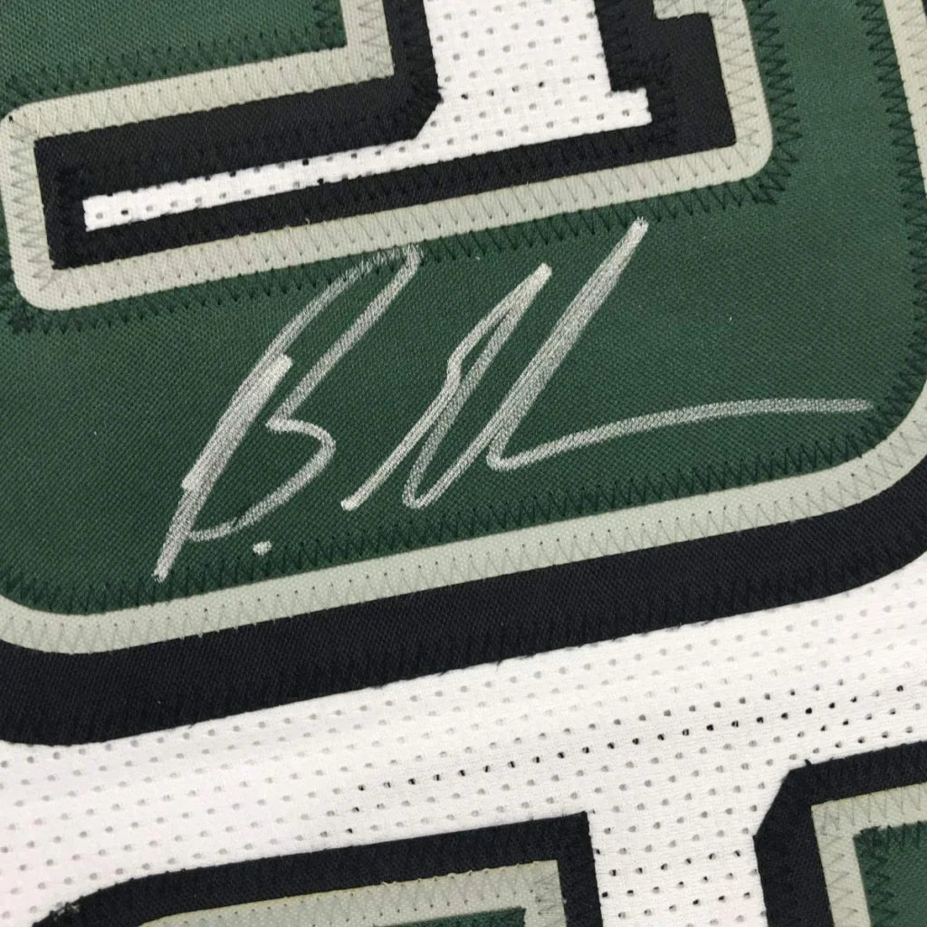 Autographed green and white Brandon Graham Eagles jersey for your man cave decor