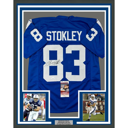 Framed autographed blue NFL jersey with player photos and commemorative plaque for display